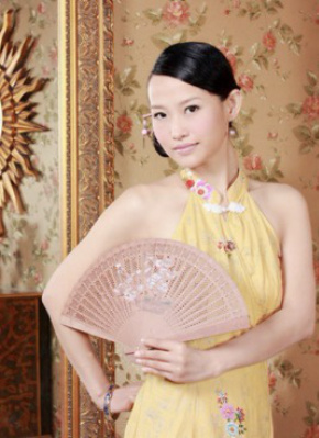 梁建美