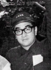 薛群