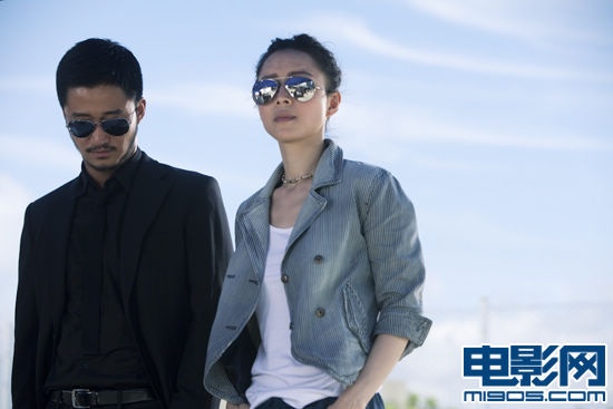 《全城戒备》好搭档 吴京、张静初戏服胜情侣装
