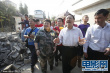 韩红戎装现身盈江慰问震区灾民 捐赠80万人民币