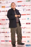 著名导演高群书亮相传媒大奖红毯 身材再次发福