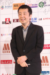 贾樟柯黑色西装从容亮相 笑容谦和大显绅士风度