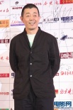 顾长卫幽默亮相传媒大奖 黑色休闲西装更显亲和