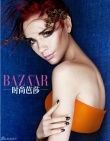 贝嫂维多利亚拍写真妆容时尚 身材骨感难掩S曲线
