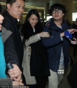 王力宏抵沪与爱妻分别现身 李靓蕾遭媒体狂围堵