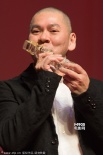 2014亞洲電影節(jié)閉幕式舉行 蔡明亮獲獎親吻獎杯