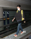 王菲台湾拍广告后返回北京 戴大口罩一言不发