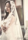 韓雪唯美婚紗寫真曝光 多款低胸造型變甜美新娘